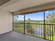 Spacious screened balcony overlooking a scenic golf course at 1933 Golfview Dr # 1933, Tarpon Springs, FL 34689