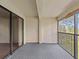 Private screened balcony with sliding glass doors at 1933 Golfview Dr # 1933, Tarpon Springs, FL 34689