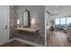 Modern entryway with wood accent wall and floating shelf at 100 1St N Ave # 2501, St Petersburg, FL 33701