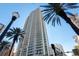 Modern high rise building with palm trees and city street view at 100 1St N Ave # 2501, St Petersburg, FL 33701