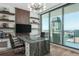 Home office with large desk, city view, and built-in shelves at 100 1St N Ave # 2501, St Petersburg, FL 33701