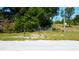Vacant land with a metal gate and mailbox at 6191 Lockhart Rd, Brooksville, FL 34602