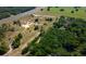 Aerial view of a property with cleared land near a highway at 6191 Lockhart Rd, Brooksville, FL 34602