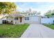 Updated one-story home with covered porch and fenced yard at 219 6Th Sw Ave, Largo, FL 33770