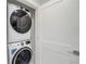 Stackable washer and dryer in a closet at 11500 Gulf Blvd # 403, Treasure Island, FL 33706