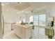 Modern kitchen with island and ocean view at 11500 Gulf Blvd # 403, Treasure Island, FL 33706