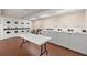 Community laundry room with multiple machines at 8911 Blind Pass Rd # 305, St Pete Beach, FL 33706