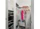 Large walk-in closet with ample shelving and hanging space at 8911 Blind Pass Rd # 305, St Pete Beach, FL 33706