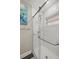 Updated walk-in shower with subway tile and glass enclosure at 8911 Blind Pass Rd # 305, St Pete Beach, FL 33706