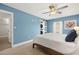 Comfortable main bedroom with a king-size bed and stylish decor at 8911 Blind Pass Rd # 305, St Pete Beach, FL 33706