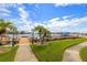 Community dock with boat slips and walkway at 8911 Blind Pass Rd # 305, St Pete Beach, FL 33706