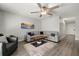 Relaxing living room with sectional sofa and wood coffee table at 8911 Blind Pass Rd # 305, St Pete Beach, FL 33706