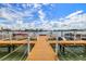 Community boat docks offer convenient access to the water for residents at 8911 Blind Pass Rd # 305, St Pete Beach, FL 33706