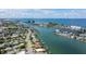 Aerial view of waterfront homes and canals at 8911 Blind Pass Rd # 305, St Pete Beach, FL 33706