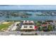 Aerial view showcasing building location and surrounding area at 8911 Blind Pass Rd # 305, St Pete Beach, FL 33706