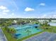 Aerial view of tennis and pickleball courts, plus a basketball court at 5134 Salmon Se Dr # A, St Petersburg, FL 33705