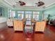 Relaxing common area with comfortable seating and hardwood floors at 5134 Salmon Se Dr # A, St Petersburg, FL 33705