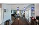 Open concept kitchen with breakfast bar and view of living room at 5134 Salmon Se Dr # A, St Petersburg, FL 33705