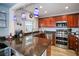 Modern kitchen with stainless steel appliances and granite counters at 5134 Salmon Se Dr # A, St Petersburg, FL 33705