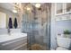 Updated bathroom with walk-in shower and modern vanity at 5134 Salmon Se Dr # A, St Petersburg, FL 33705