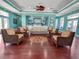 Community lounge with comfortable seating and a compass design at 5134 Salmon Se Dr # A, St Petersburg, FL 33705