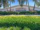 Waterside community entrance with lush landscaping and signage at 5134 Salmon Se Dr # A, St Petersburg, FL 33705