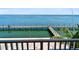 View from balcony showing a boardwalk, water access, and ocean views at 5134 Salmon Se Dr # A, St Petersburg, FL 33705