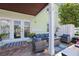 Covered patio with seating area and access to interior at 5134 Salmon Se Dr # A, St Petersburg, FL 33705