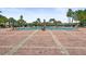 Large, inviting community pool with brick patio and lounge chairs at 5134 Salmon Se Dr # A, St Petersburg, FL 33705