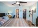 Main bedroom with king bed, ensuite bathroom and walk-in closet at 5134 Salmon Se Dr # A, St Petersburg, FL 33705