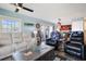 Living room with comfortable seating and access to the kitchen and patio at 5134 Salmon Se Dr # A, St Petersburg, FL 33705