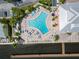 Community pool with sundeck and waterfront access at 5134 Salmon Se Dr # A, St Petersburg, FL 33705