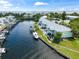 Bird's eye view of waterfront community, showcasing various buildings and boat docks at 5134 Salmon Se Dr # A, St Petersburg, FL 33705