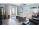 Relaxing living room featuring a large sectional sofa and a view to the back yard at 5134 Salmon Se Dr # A, St Petersburg, FL 33705