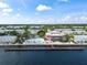 Aerial view of community pool, clubhouse, and waterfront access at 5134 Salmon Se Dr # A, St Petersburg, FL 33705
