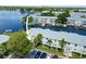 Aerial view of waterfront community with boat slips and lush landscaping at 5134 Salmon Se Dr # A, St Petersburg, FL 33705