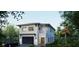 Charming two-story home boasting a modern design, clean lines, and inviting curb appeal at 1045 Conant Ave, Safety Harbor, FL 34695