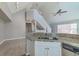 Modern kitchen with granite countertops and stainless steel appliances at 9028 Lake Chase Island Way, Tampa, FL 33626
