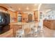 Modern kitchen with granite countertops and a large island at 10177 Sunburst Ct, Spring Hill, FL 34608
