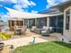 Backyard oasis with a pergola, seating, and a pool at 10177 Sunburst Ct, Spring Hill, FL 34608