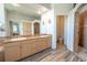 Spacious main bathroom with double vanity and walk-in shower at 10177 Sunburst Ct, Spring Hill, FL 34608
