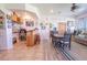 Casual dining area with table and chairs, adjacent to a bar at 10177 Sunburst Ct, Spring Hill, FL 34608