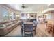 L-shaped dining area with a view of the backyard at 10177 Sunburst Ct, Spring Hill, FL 34608