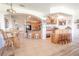 Home bar with wood cabinetry and wine storage at 10177 Sunburst Ct, Spring Hill, FL 34608