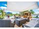 Outdoor patio area with pool, gazebo, and seating at 10177 Sunburst Ct, Spring Hill, FL 34608