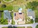 Bird's-eye view of house, pool, and surrounding area at 10177 Sunburst Ct, Spring Hill, FL 34608