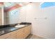 Clean bathroom with a single sink and granite countertop at 10177 Sunburst Ct, Spring Hill, FL 34608
