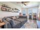 Spacious Gathering room featuring a large sectional sofa and ample natural light at 10177 Sunburst Ct, Spring Hill, FL 34608