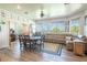 Gathering room with large sectional sofa and windows at 10177 Sunburst Ct, Spring Hill, FL 34608
