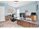 Home office with a large desk, exercise equipment, and ample space at 435 Westwinds Drive, Palm Harbor, FL 34683